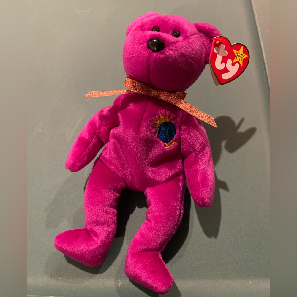 NWT BEANIE BABY - “Millenium” bear, kept in collector case.